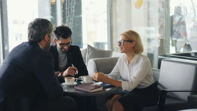 Financial professionals collaborating in a modern office