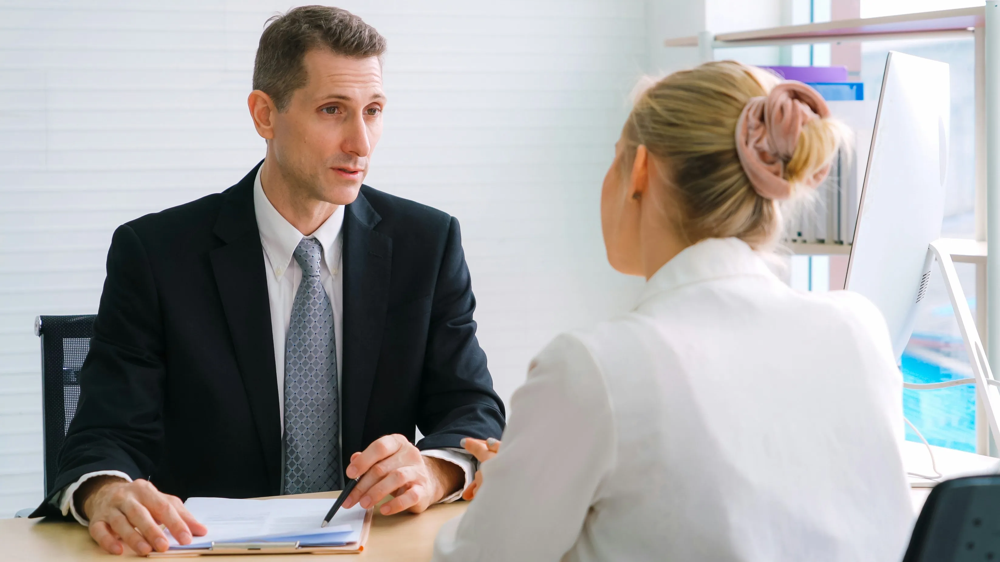 Two business professionals in a one-on-one consultation